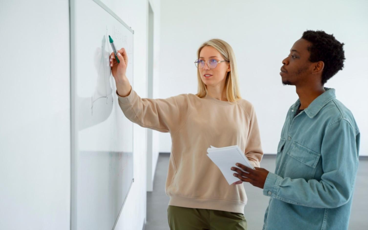 Business owner reviewing financial documents in modern Australian office setting